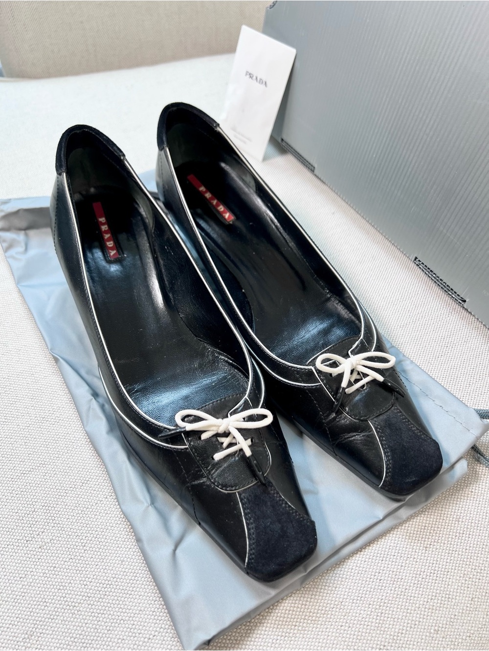 Prada Black Leather & Suede Heels with White Bow Trim